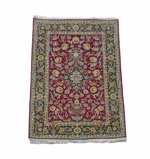 An old carpet with beautiful patterns and texture