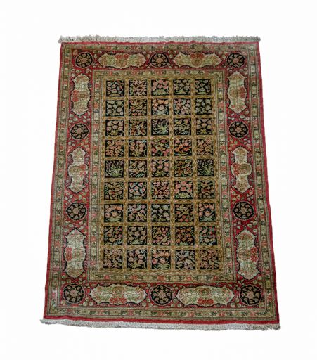 A closeup of a carpet with beautiful ornaments isolated on a white background