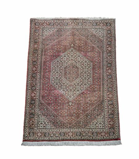 An old carpet with beautiful patterns and texture