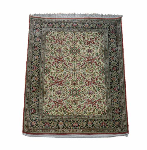 A closeup of a carpet with beautiful ornaments isolated on a white background