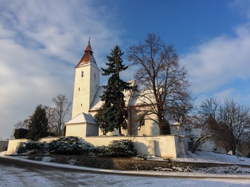 Church of the Nativity of St. John the Baptist, built in Romanesque style with a Baroque extension. In the village of Hovorcovice near Prague.