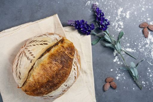 A top view of freshly baked bread and flowers