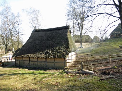 An autumn view with a hut in a farmland