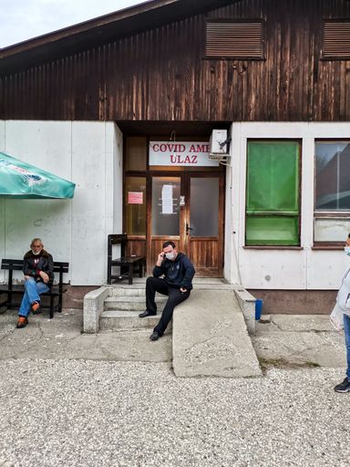 A male on the phone with his family after getting coronavirus test results in Velika Plana, Serbia