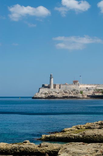 A vertical shot of the Castillo Del Morro Lighthouse in Havana during daylight