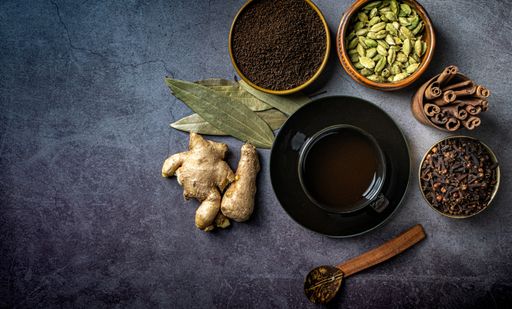 A top view of Indian seasonings and spices on a table