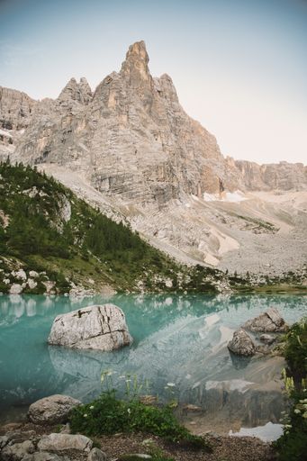 A vertical shot of the beautiful Lake Sorapis in Cortina, Italy during daylight