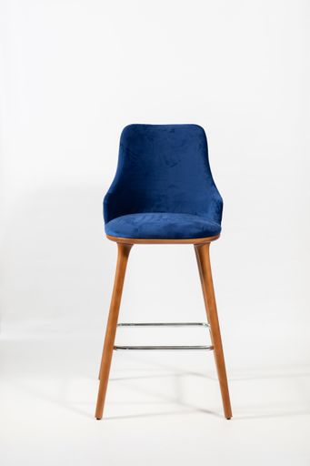 A vertical shot of a blue chair made up of wooden legs