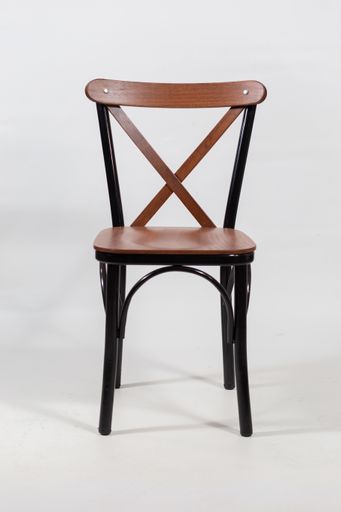 A beautiful shot of a wooden chair isolated on a white background
