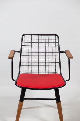A beautiful shot of a modern metal chair isolated on a white background