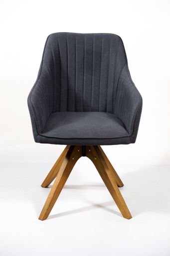 A beautiful shot of a stylish grey chair isolated on a white background