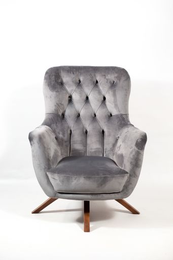 A grey comfortable armchair isolated on a white background