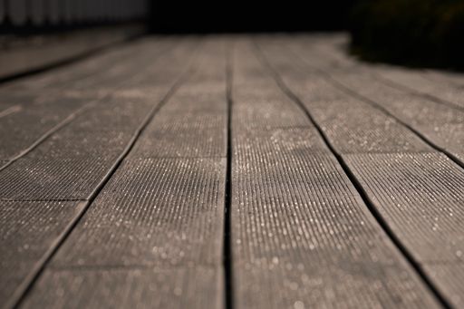 A closeup of a wooden floorboard