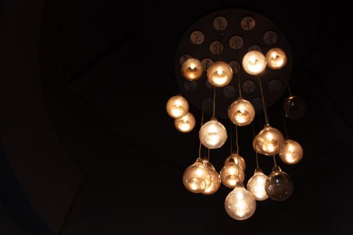 A closeup shot of bright round decorative lights hanging