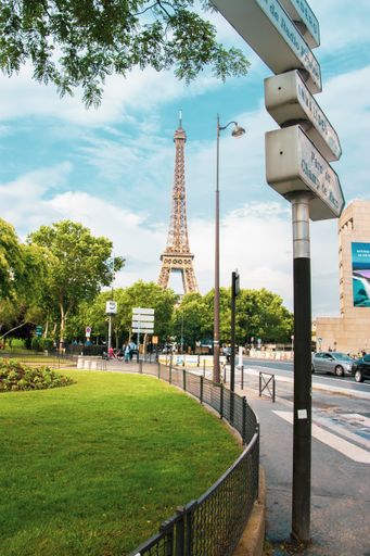 A vertical shot of Paris with the Eiffel Tower on the background