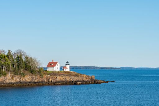 This iconic and still operational lighthouse sits on Curtis Island in the town of Camden, Maine. The sky's negative space draws the eye to the light.