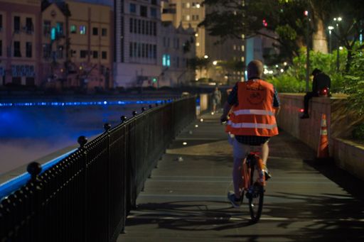 A closeup shot of a man riding his bike to see what his city has to offer