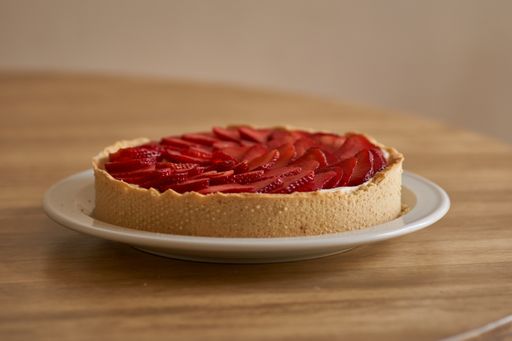 A closeup shot of a strawberry pie on the table