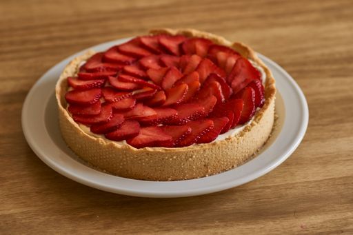 A closeup shot of a strawberry pie on the table