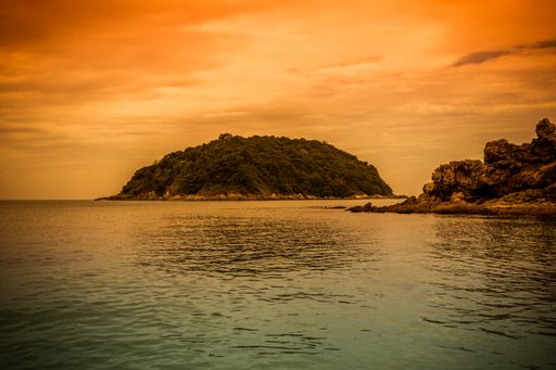 A mesmerizing shot of a seascape during the sunset Koh Man,Ya Nui Beach in Phuket