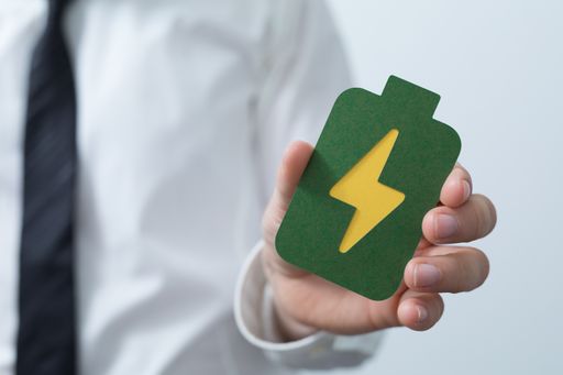 A sign of the electricity in the hands of a man