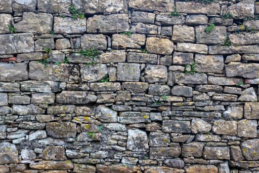 A Texture of a stone wall. Old castle stone wall texture background.