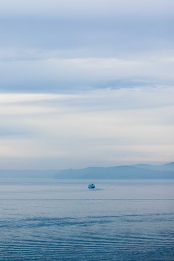 A vertical shot of the Ferry of the Northwest Pacific during sunset