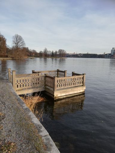 A tranquil scenery of the lakeside in the Royal National City Park in Stockholm, Sweden