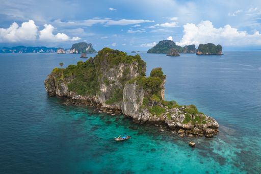 A beautiful view of Islands in Thailand under the blue, partly cloudy sky