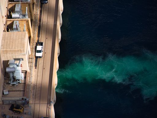 A view from the top of the Hoover Dam located in Nevada next to the sea.