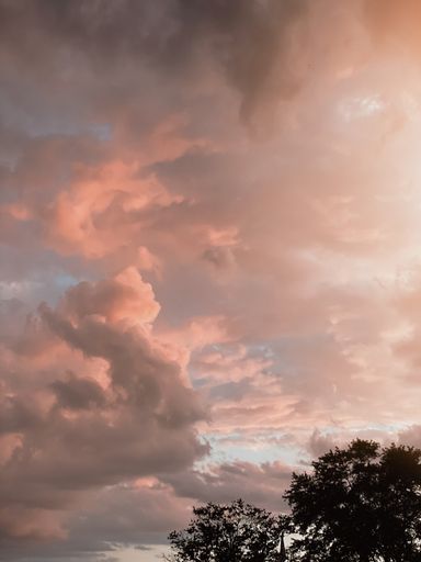 A vertical shot of the sky during a beautiful sunset