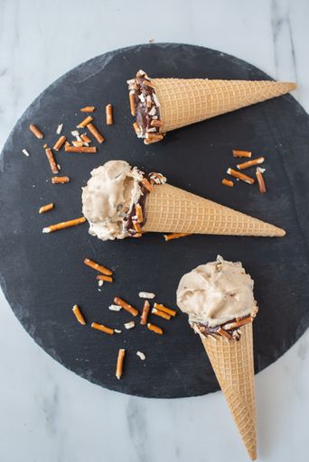 A beautiful shot of home made ice cream cones with chocolate
