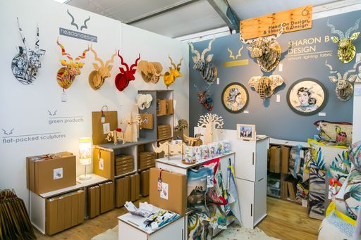 A beautiful shot of items on display at exhibitor stand at hand-made design fair