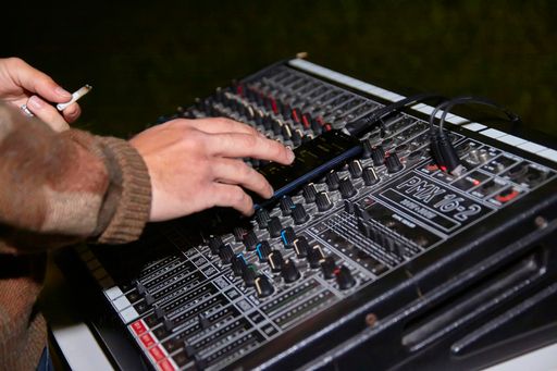 Detail of an audio mixer used to pump music at a party