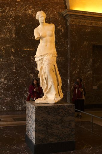 The Venus de Milo sculpture in the hall of classical Hellenistic art in Louvre, Paris, France