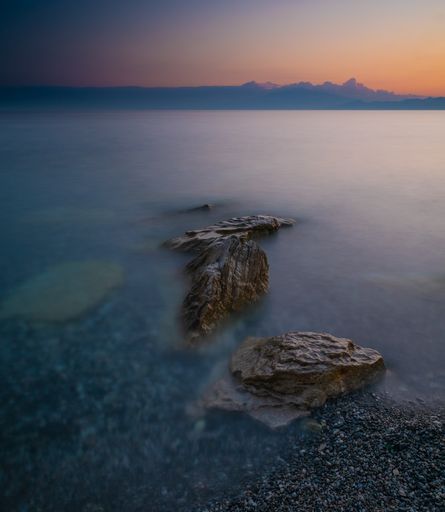 The view of the sea and rocks. Long exposure landscape.