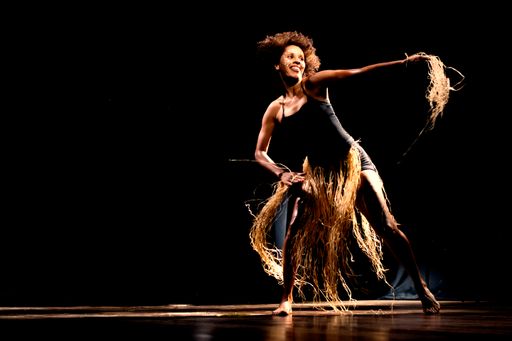 A beautiful shot of a young female performer on stage in Brazil
