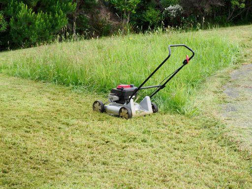 Old Masport lawn mower mulcher with Briggs and Stratton 650 series 190cc engine. Auckland, New Zealand - November 30 2021