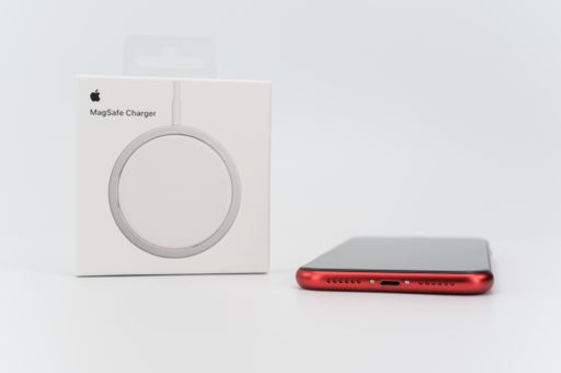 MagSafe wireless induction device charger with cable on a white background with text space