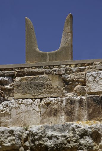 A vertical low angle shot of the beautiful Minoan Palace of Knossos captured in Knossos, Greece