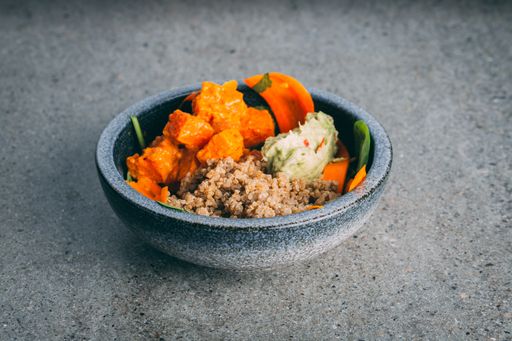ACloseup of fried vegetables and rice served on a bowl