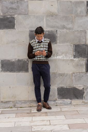 A scenic shot of a young Hispanic enterprising man, striving for his business