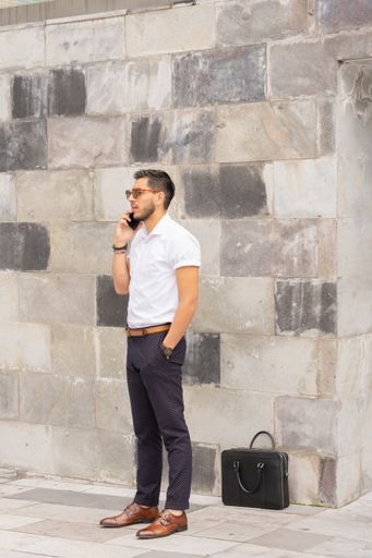 A scenic shot of a young Hispanic enterprising man, striving for his business