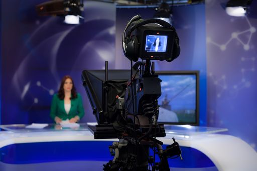 A close-up shot of a video camera for shooting or recording a show in a TV studio
