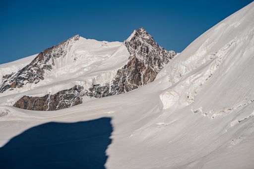 View of Monte Rosa masiff, Wallais, Switzerland. High alpine galcial mountain landscape. Creavases, ice and snow. Nordend, Dufourspitze.