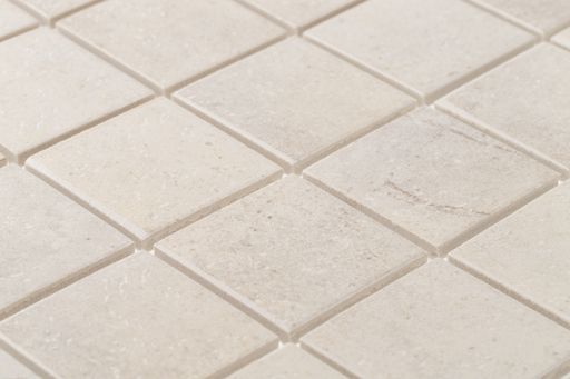 A high angle shot of square white tiles - good for a background