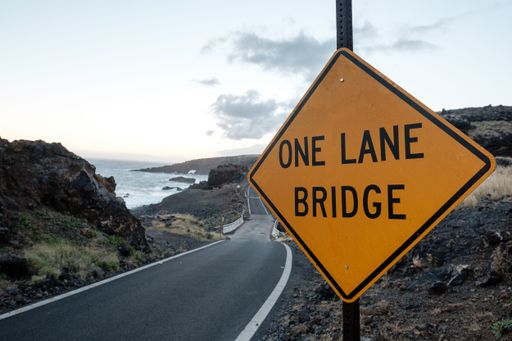 A closeup shot of a street sign near a road in Capetown in South Africa