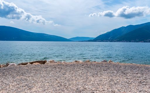 The cloudy sky over the Adriatic Sea and the Kotor bay in Montenegro in summer