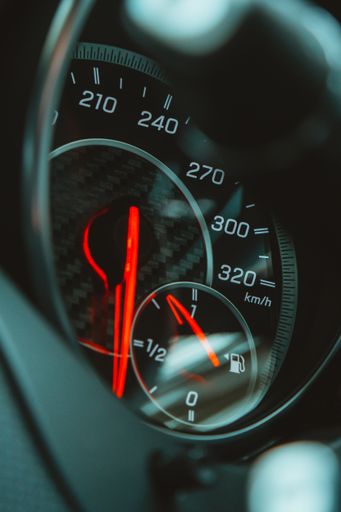 A closeup of a Mercedes Benz AMG car Speedometer