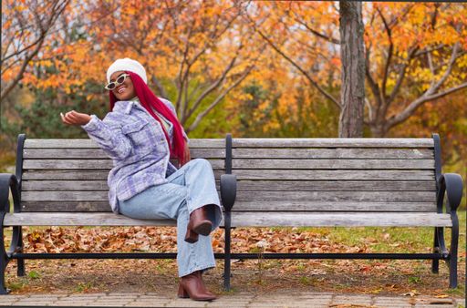 A shot of African red head girl with white hat posing in Liberty State Park in Jersey City, NJ.